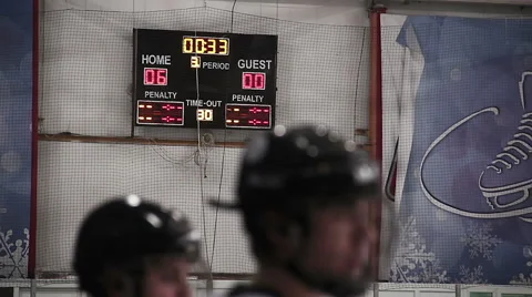 Final countdown in last period of hockey match on scoreboard, home team wins Stock Footage