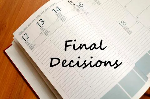 Final decisions write on notebook Stock Photos