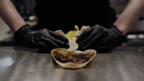 Final Fold of Quesadilla with Meat and Veggies Stock Footage 307075817