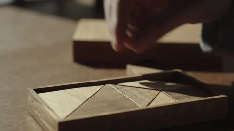 Final Piece Completes Wooden Geometric Puzzle and Reveals Solution Stock Footage 337762805