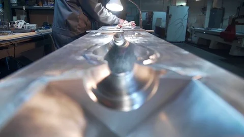 Final process of doing shapes for details foundry, worker does inspection of Stock Footage 73076083