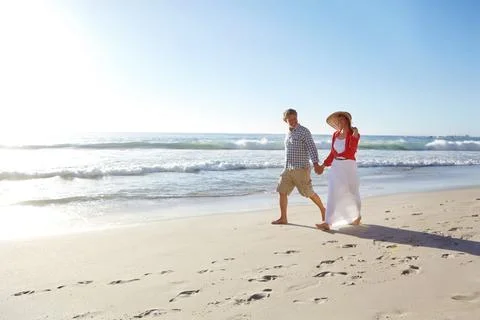 The final rays of a perfect day. a mature couple enjoying a late afternoon walk Stock Photos