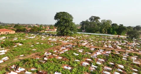 Final Rest A Drone View of Guinea-Bissau’s Large Cemetery Stock Footage 322724004
