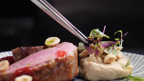 Final touch in dish serving. Cooking process. Luxury restaurant. Chef finishing Stock Footage 238457056