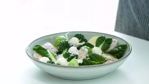 Final Touch on Salad with Cheese Stock Footage 334280349