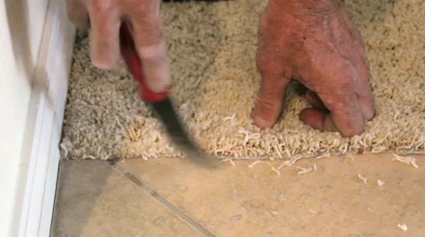 Finalizing a carpet repair Stock Footage 50809433