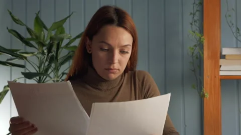 Finance analysis, check bills feels stressed and worried due lack of money Stock Footage 142831635