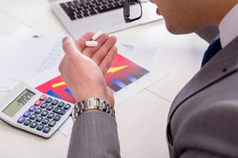 Finance analyst feeling sick due to bad results Stock Photos