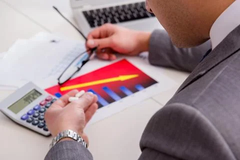 Finance analyst feeling sick due to bad results Stock Photos