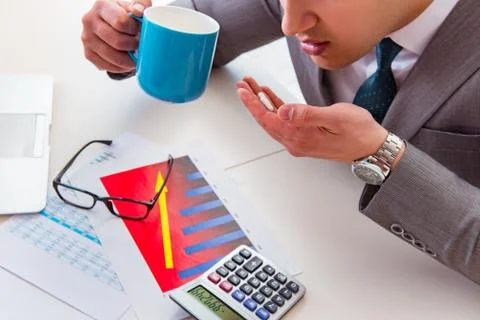 Finance analyst feeling sick due to bad results Stock Photos