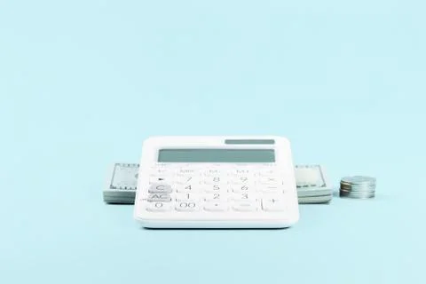Finance with calculator and stack of money Stock Photos