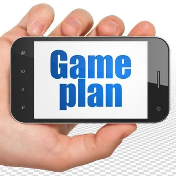 Finance concept: Hand Holding Smartphone with Game Plan on display Illustrazione stock