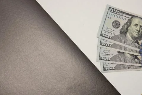 Finance concept pattern dollar banknotes on black and white paper monochrome  Stock Photos