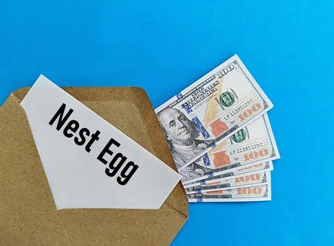 Finance concept, US Dollar with envelope and white card printed nest egg Foto stock