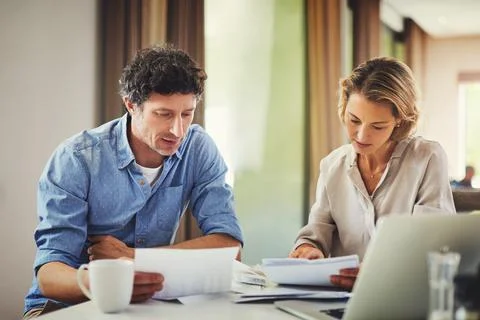 Finance, couple or reading document in home for budget planning, mortgage d.. Stock Photos