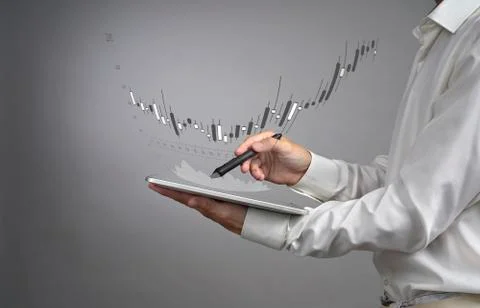 Finance data concept. Man working with Analytics. Chart graph information with Stock Photos