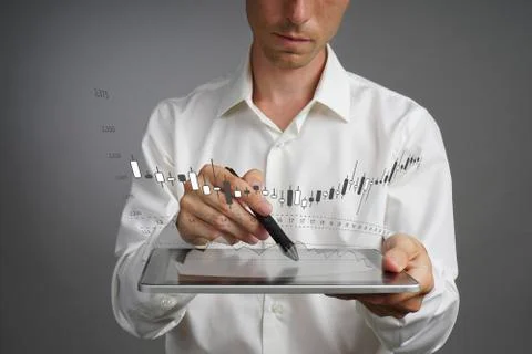 Finance data concept. Man working with Analytics. Chart graph information with Stock Photos