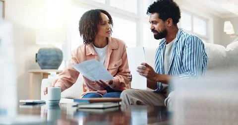 Finance, documents and couple with bills in home for budget planning or tax Stock-Fotos