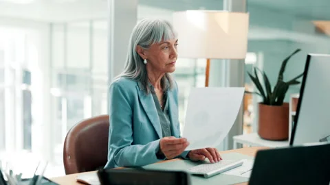 Finance, paper or analyst in office with computer, funding plan or data analysis Stock Footage 330042685
