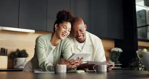 Finance, paperwork or happy couple with tablet in kitchen for loan settlement, Stock Footage 336846859