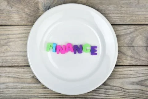 Finance on plate Stock-Fotos