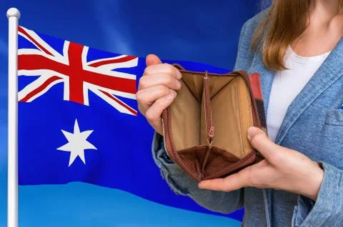 Finance problem in Australia. Poor person with empty wallet on national flag  Foto stock