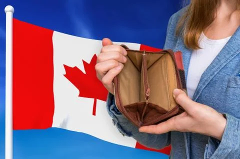 Finance problem in Canada. Poor person with empty wallet on national flag bac Stock Photos