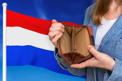 Finance problem in Netherlands. Poor person with empty wallet on national fla Stock Photos