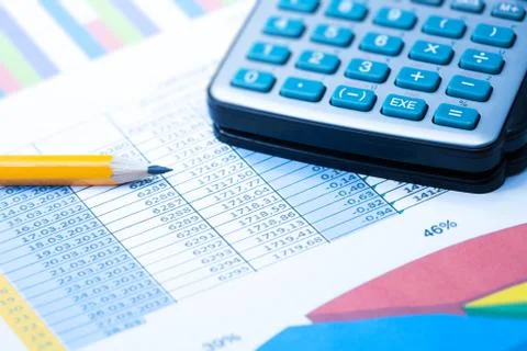 Finance Statistical graphs and calculator Stock Photos