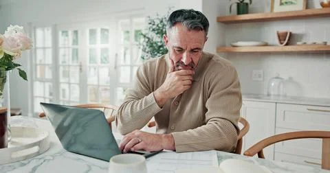 Finance, thinking or man in house with laptop, expense analysis or cost con.. Stock Photos