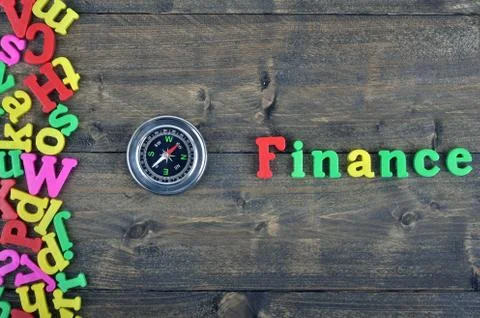 Finance on wooden table Photos