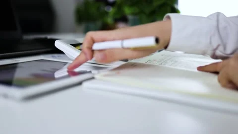 Financial accountants conduct financial accounting and bookkeeping Stock Footage