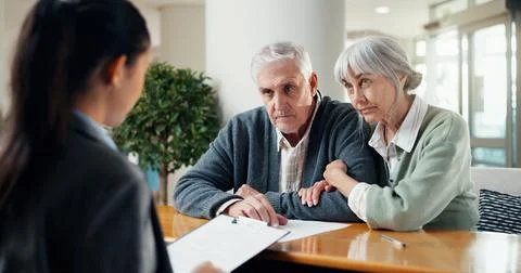 Financial advisor, documents and senior couple in office with life insurance Stock Photos