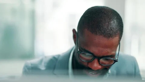 Financial advisor, glasses or black man in office, computer for investment Stock Footage 330043700