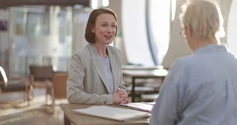 Financial advisor meeting with client Video stock 86530571