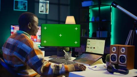 Financial analyst checking isolated chroma key and balance to calculate cost 스톡 사진