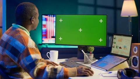 Financial analyst checking isolated chroma key and balance to calculate cost Stock Photos
