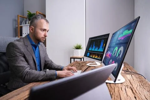 Financial Analyst Or Advisor Using KPI Data Technology Stock Photos