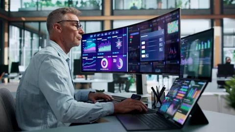 Financial Analyst Pointing At Predictive Dashboard Stock Footage 344710509