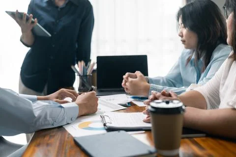 Financial analyst presented a detailed data analysis graph to their colleag.. Stock Photos
