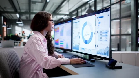 Financial Analyst Reviewing Data Dashboard Stock Footage 346329455