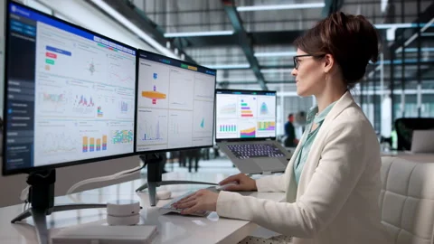 Financial Analyst Reviewing Key Performance Indicators Stock Footage 342973114