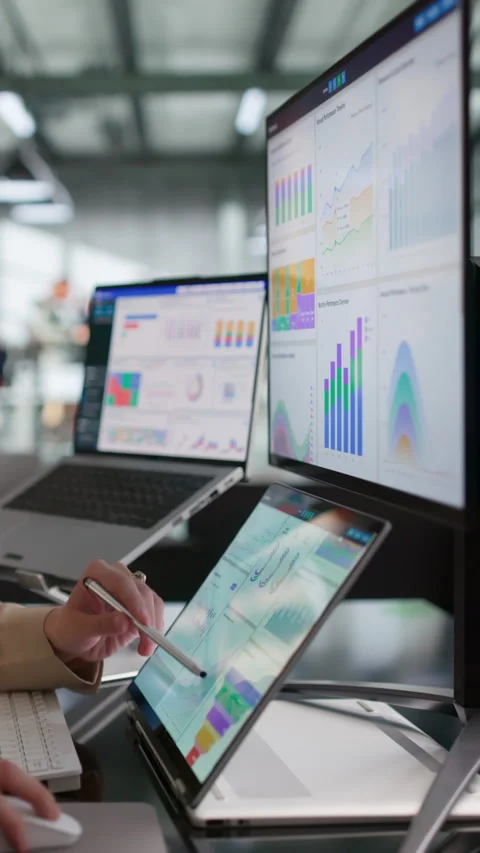 Financial Analyst Reviewing KPI Dashboard On Laptop Stock Footage 339909457