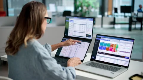 Financial Analyst Reviews Cloud Spend Optimization Stock Footage 345855422
