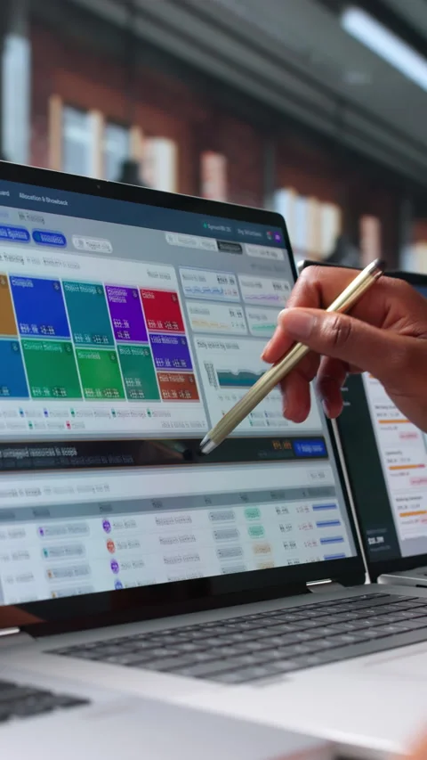 Financial Analyst Studies Cloud Cost Reports On Laptop Stock Footage 344724150