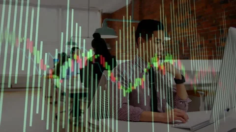 Financial analyst typing on computer and initiating candlestick chart updating Stock Footage 313169792