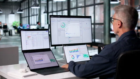 Financial Analyst Uses Touchscreen Computer Stock Footage 345319386
