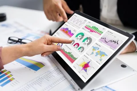Financial Analyst Using Convertible Laptop Screen Stock Photos