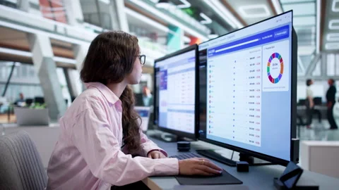 Financial Analyst Woman Using Computer To Prepare Corporate Budget Forecasts Stock Footage 345863252