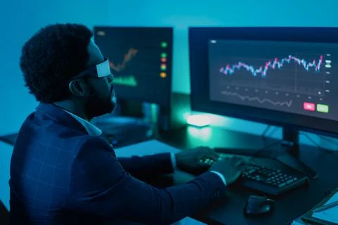 Financial analyst working on NFT blockchain tech with virtual reality glasses Stock Photos